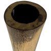 Vysoká nádoba z kmene kokosu, která spojuje přírodní materiál s jedinečným designem, ideální pro minimalistický nebo tropický interiér.